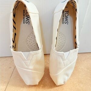 TOMS Cream Canvas Slip-Ons
